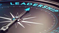 A compass pointing to the word 'Leadership'.