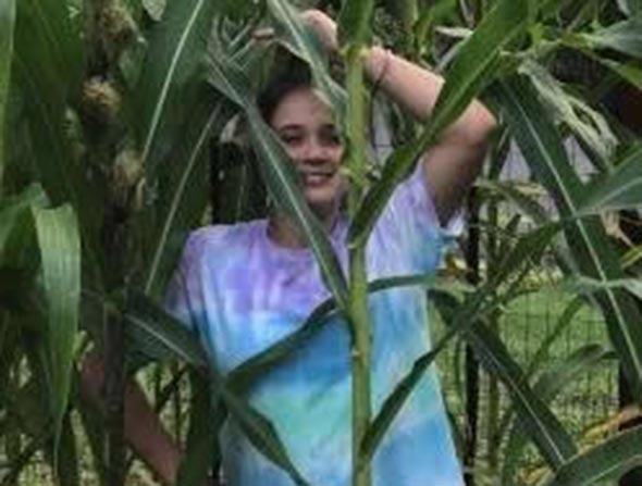 Photo of 4Her in corn