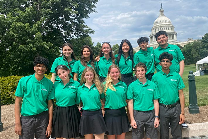 Citizenship Washington Focus participants standing  in front of the Capitol.