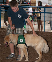 4-Her showing his puppy.