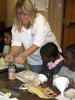 Educator with 4-H members.